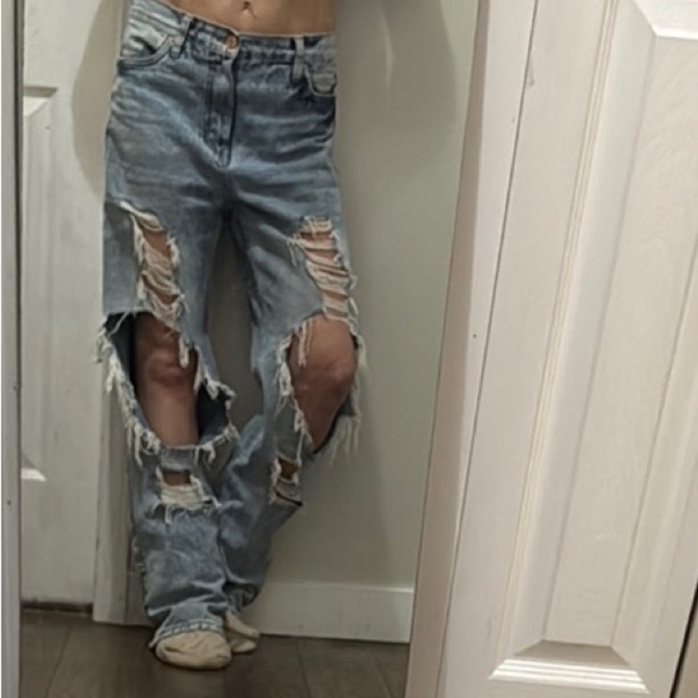 Distressed Light Blue Jeans